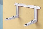 Rodigas MS257 White Wall Bracket Mounted On Yellow Building Facade For Outdoor Air Conditioner Unit Installation